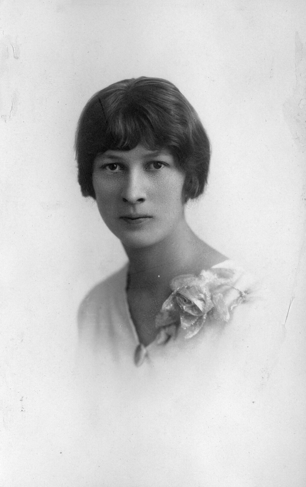 Female Ligman family member against light background