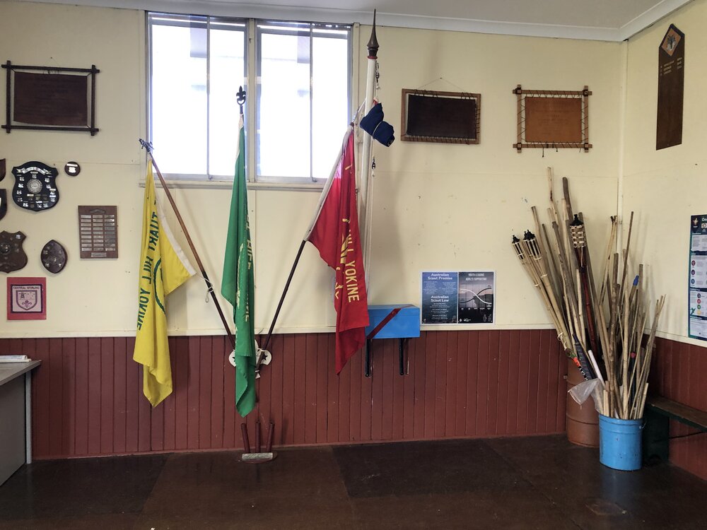 Scout flags inside Weeloc House Scout Hall