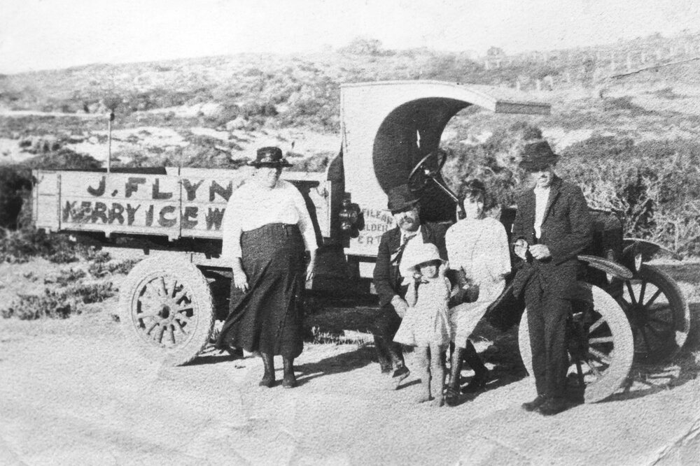 Flynn family with ice delivery truck