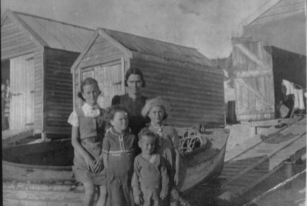 Dorothy Stubberfield with her children at Trigg beach 