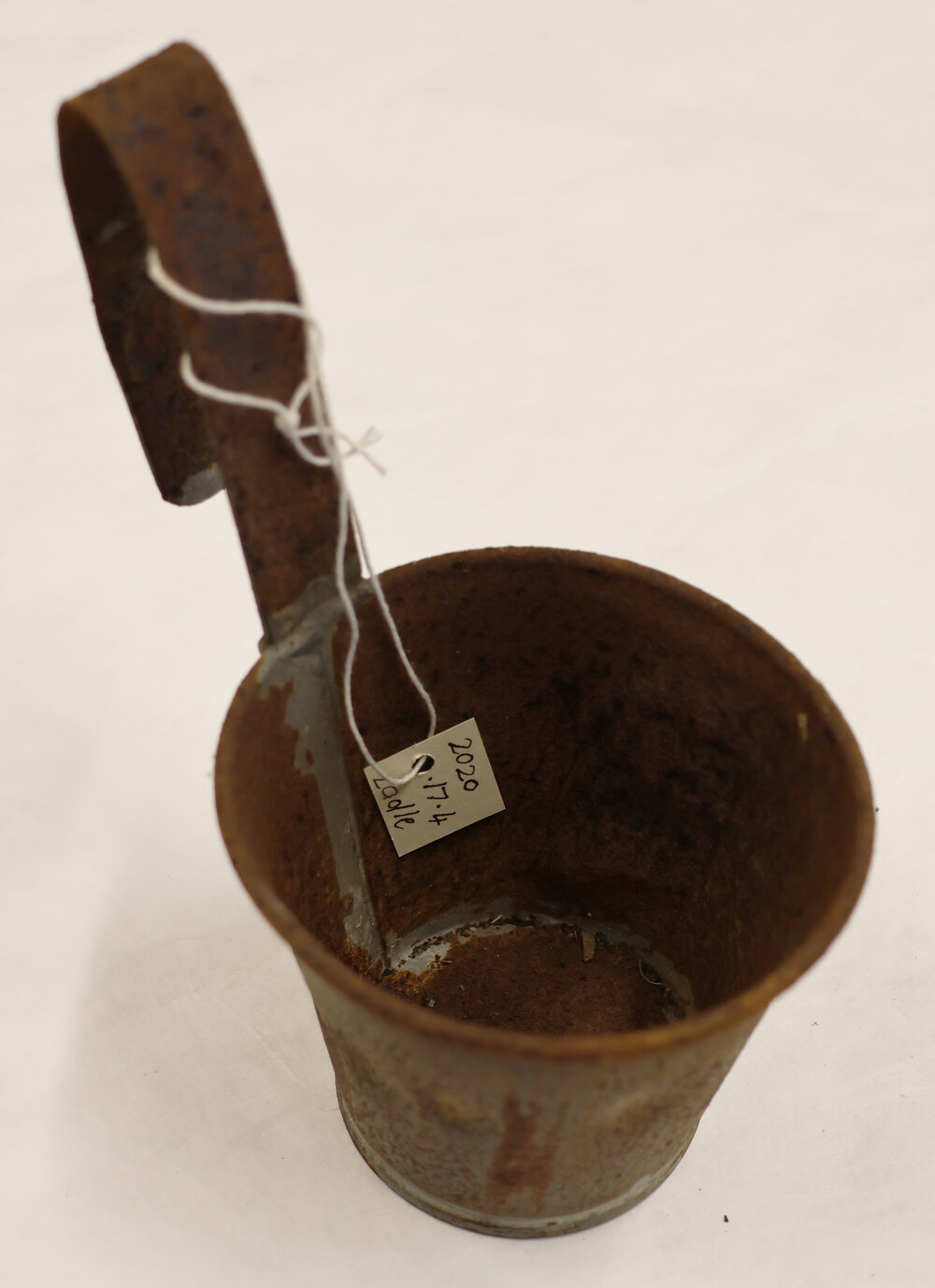 Milk ladle associated with Ned Healy