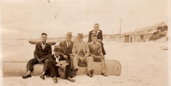 Group of men on a beach