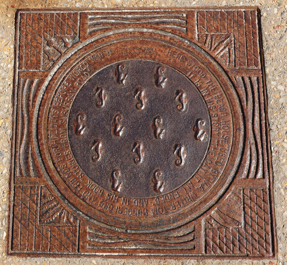 Heritage site marker for Tom Hungerford's (T.A.G.) house
