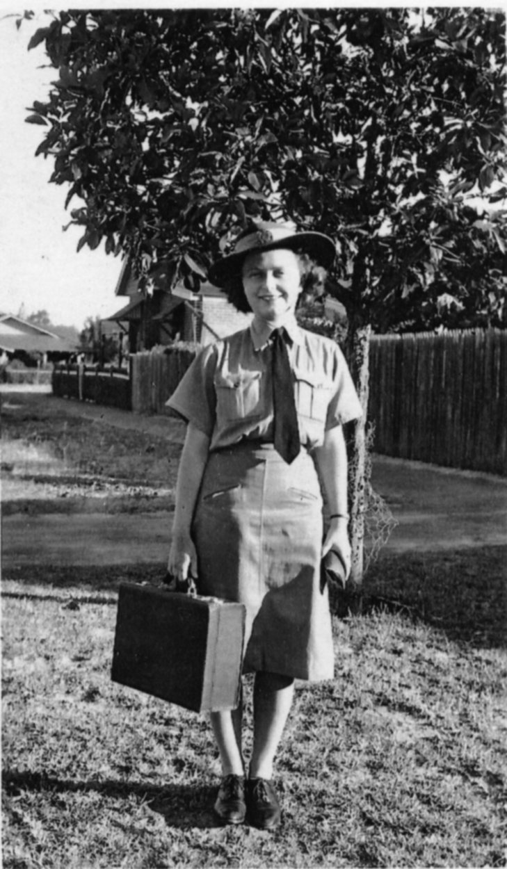 Eleanor Jefferies carrying overnight case for sleepover rostered duty in Mount Lawley.  She was in the Air Force around 1943.  
