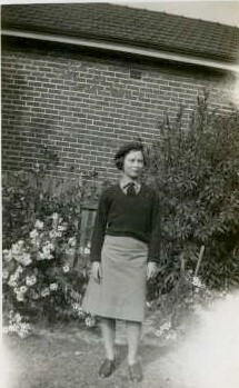 Eleanor Jefferies dressed in World War Two Airforce uniform c1943