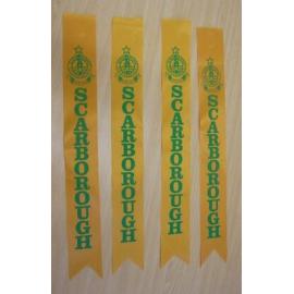 Five gold ribbons with Scarborough Senior High School logo