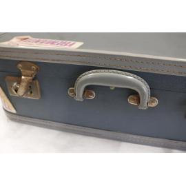 Suitcase blue with labels