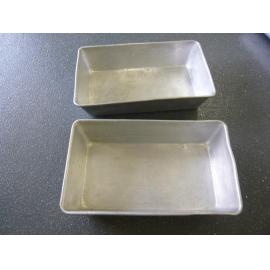 Two metal cake baking tins