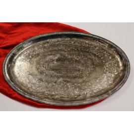 Silver tray and red velvet bag