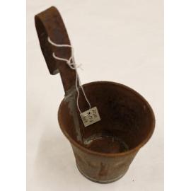 Milk ladle associated with Ned Healy