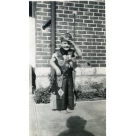 Young boy playing cowboys taken at a family home in Green Street Joondanna 