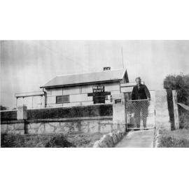 Willoughby Lance at gate of "Lancecote" Flora Terrace, North Beach 