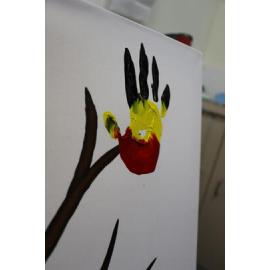 The first hand is painted on the artwork