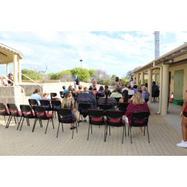 The crowd listens to Marie Taylor as she shares Dreamtime stories