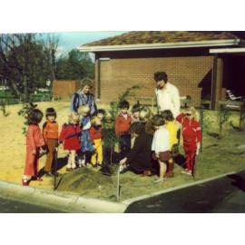 Student planting a tree at the Tuart Hill Primary School in Aug 1978 
