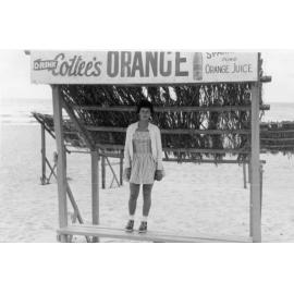 Scarborough High School sports mistress Ruth Kern under sun shade at Scarborough Beach