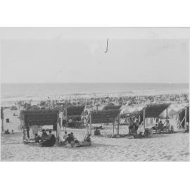 Scarborough Beach with shelters made from palm leaves