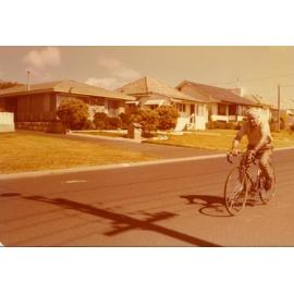 Ronald William riding his bike along Floyd Streeti nTrigg c1978