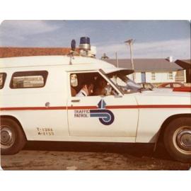 Road Traffic Authority patrol car giving out ticket at Brighton Beach in Scarborough c1980