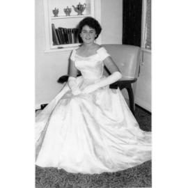 Rae Kolb in long dress and gloves