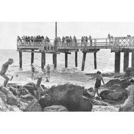 Swimmers at North Beach Jetty