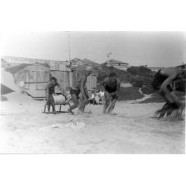 North Beach boat sheds and lifesavers c1951