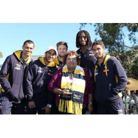 NAIDOC 2014 - Elder Beverley Port-Louis with Eagles footballers