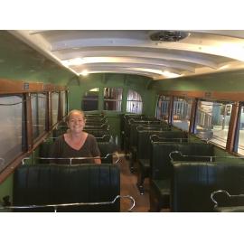 Museum curator Tracy Willet on excursion to Revolutions Museum-sitting in restored Scarborough Bus No 15