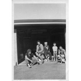Mum, Dad, Kyle, Kevin and Ron in their garage at 8 Floyd Street in Trigg c1972
