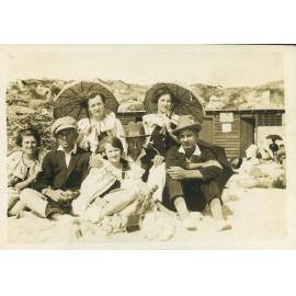 Milner family group sitting at North Beach