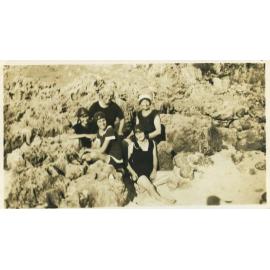 Milner family at North Beach sitting among the rocks