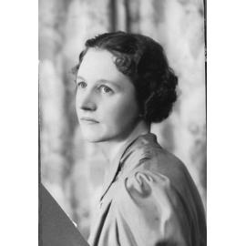 Female Ligman family member looking over her shoulder