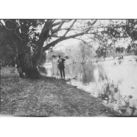 Three people at the edge of Lake Gwelup, members of the Ligman family