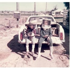 John and Ruth Arbuckle preparing to rob bee hives on their property in Duffy Road