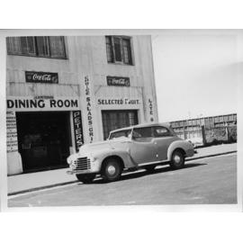 Car parked outside Johannes and Bertha Petersen Scarborough tea room c1950 