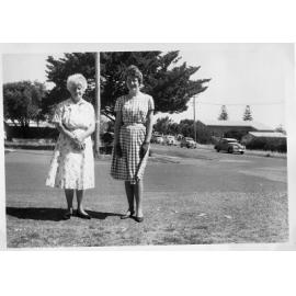Joan Petroboni and her grandmother stand by the road