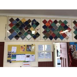 Scout scarves on display at Weeloc House Scout Hall