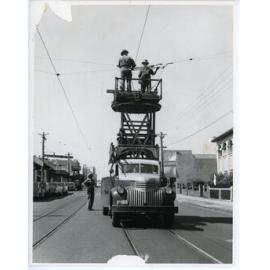 Installing trolley bus cables in Mount Lawley