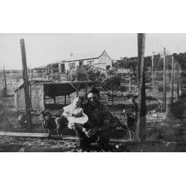 Harold Bransby with Marlene Gordon in front of turkey pen at Castle street North Beach