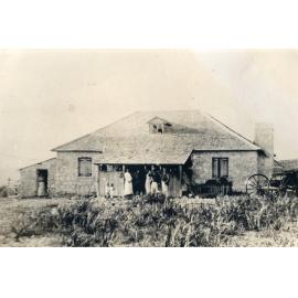Hamersley family cottage in North Beach with family standing outside