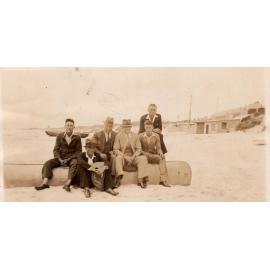 Group of men on a beach