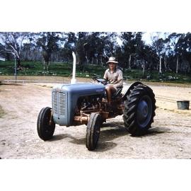 Graeme Arbuckle driving a tractor