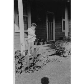 Giuseppe D'Alonzo on family porch in Osborne Park c1960
