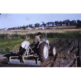 George Stergiou driving a tractor on the Stergiou market garden