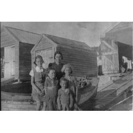 Dorothy Stubberfield with her children at Trigg beach 