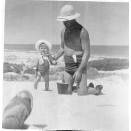 Father and daughter enjoy the beach at Brighton Beach in Scarborough 1946