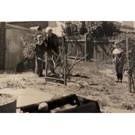 Family in the garden of 64 John Street Inglewood 
