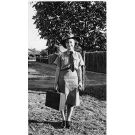 Eleanor Jefferies carrying overnight case for sleepover rostered duty in Mount Lawley.  She was in the Air Force around 1943.  