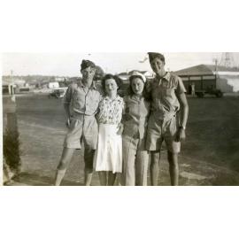Eleanor Jefferies and friends in Scarborough with Luna Park in the background c1943 