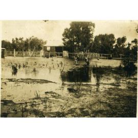 Early settler house during flood